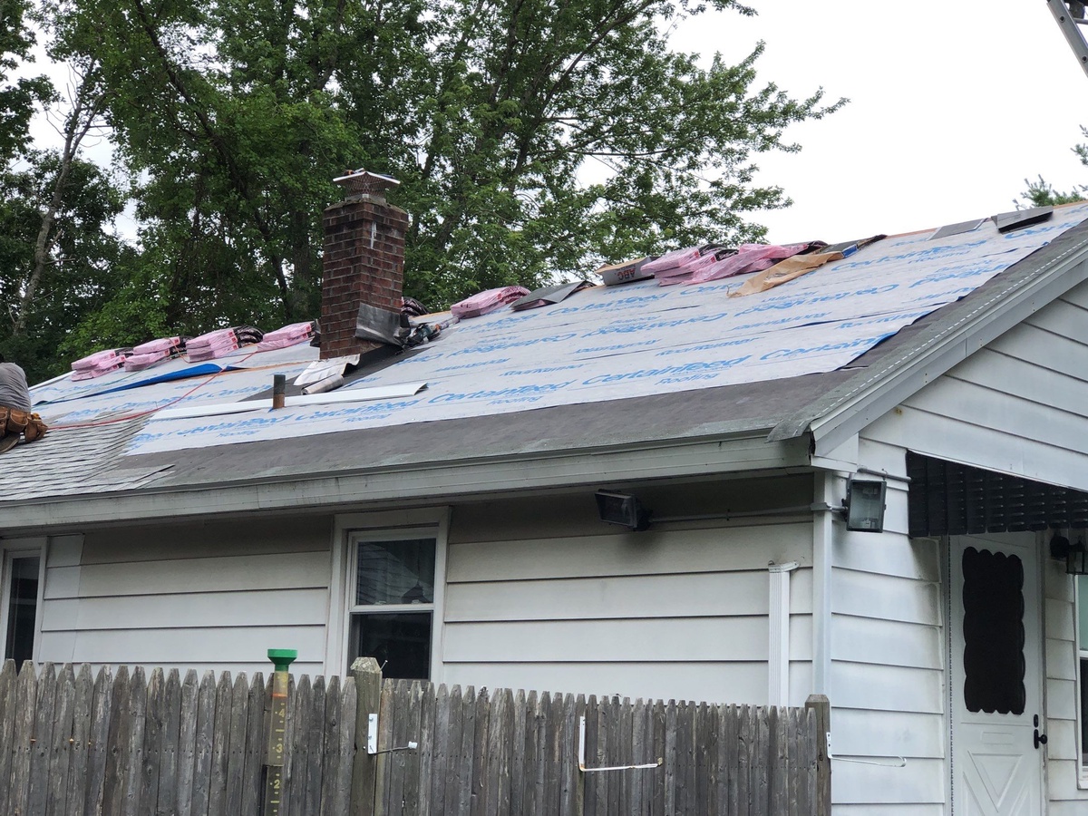 Roof tear off in progress Exeter RI ranch
