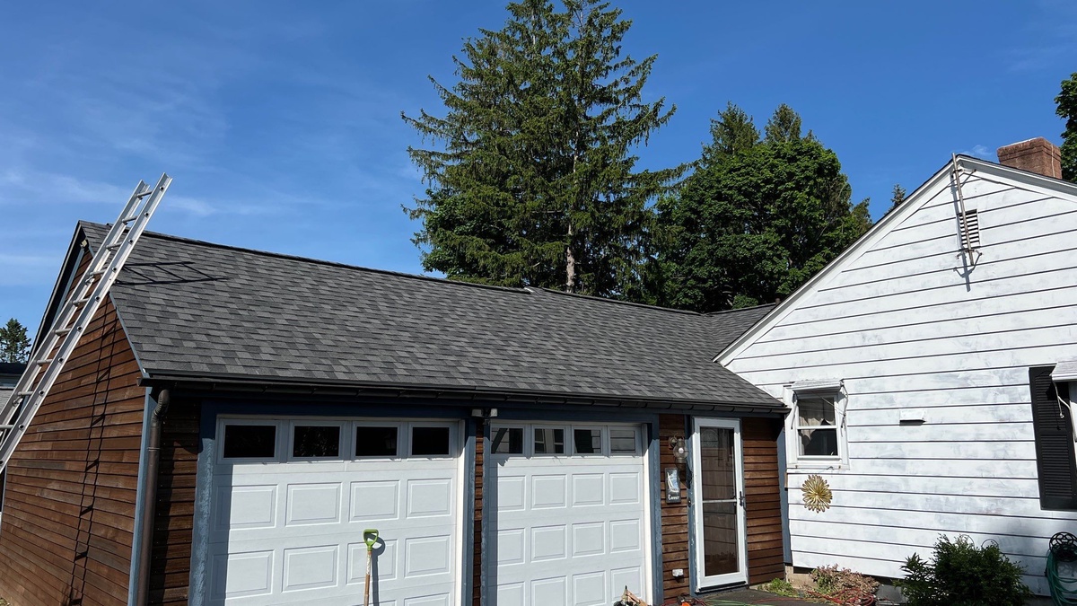 Garage and house roof planes after Warwick RI storm restoration