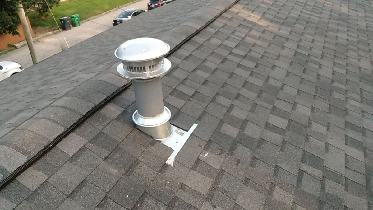 New roof vent sealed into Pewterwood shingles Warwick RI