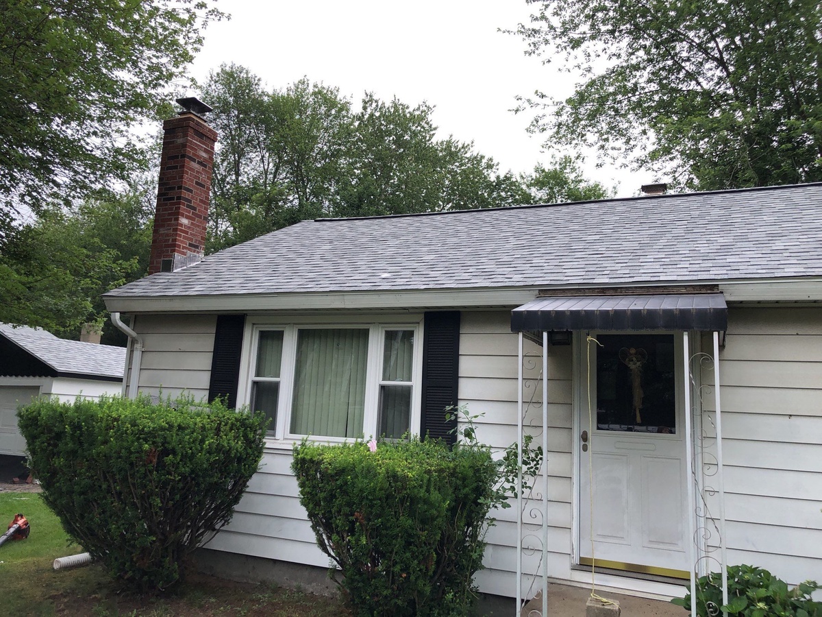 Front entry detail new Duration roof Exeter RI