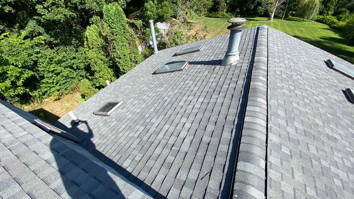 New Landmark roof and skylights from above insurance claim roof replacement Cranston Rhode Island