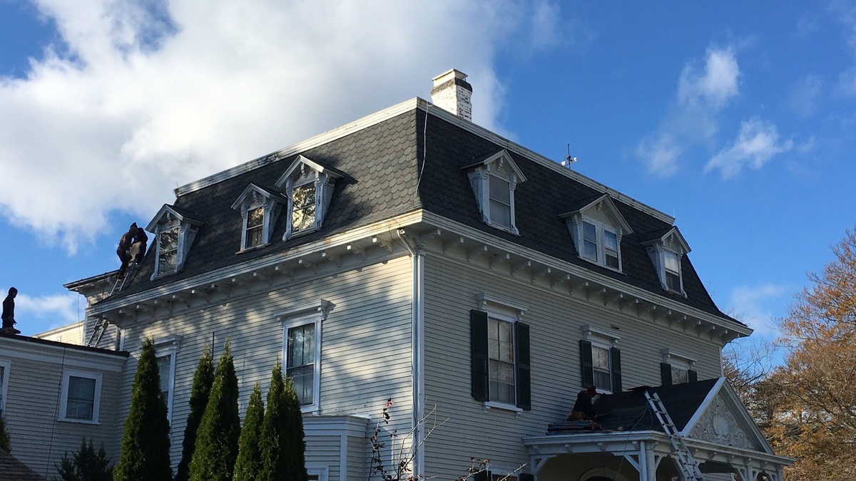 Dormers and steep mansard slopes reroofed in Newport RI