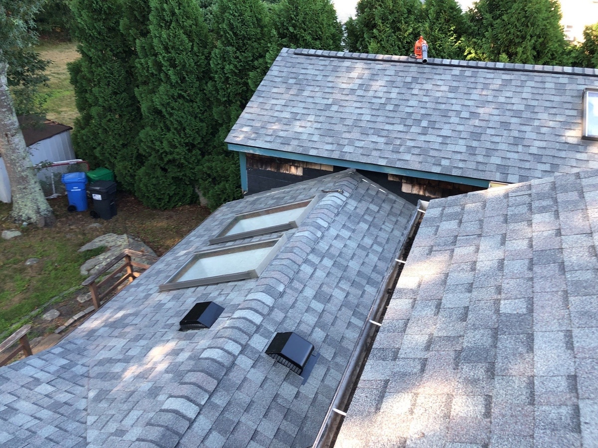 Colonial Slate roofline with new seamless gutters, South Kingstown
