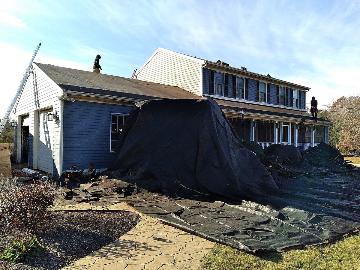 Tear-off underway on Hopkinton RI colonial farmhouse roof