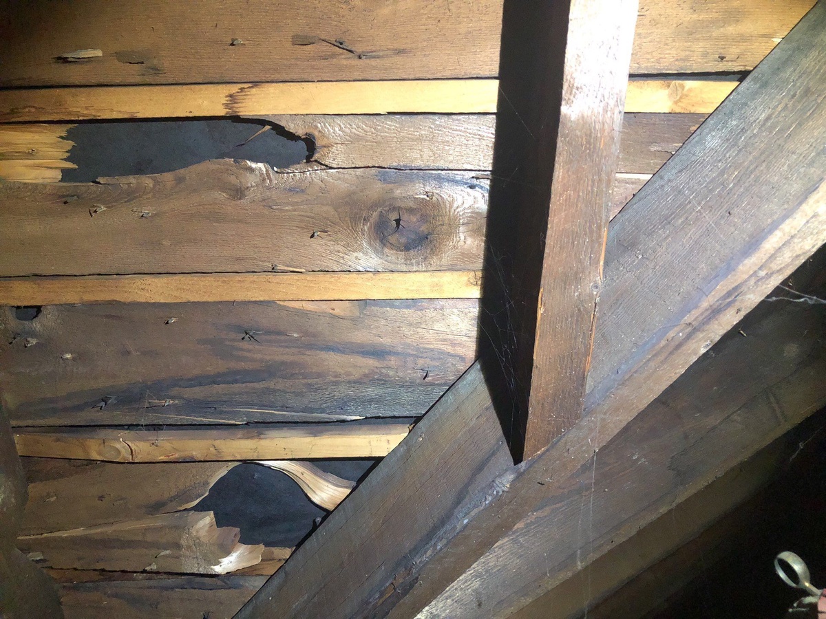 Original century-old plank sheathing on Lincoln RI roof rebuild