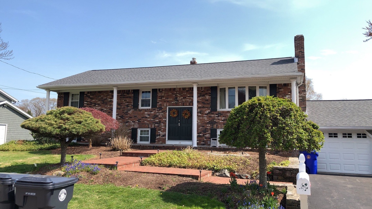 After — A Solar-Ready Roof Replacement — CertainTeed Landmark Pewterwood on a North Providence, RI Brick Ranch