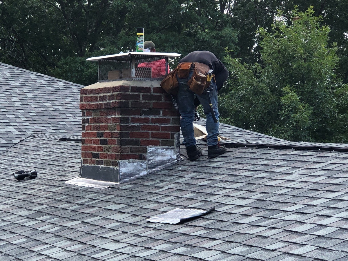 After — Insurance-Approved Wind Damage Replacement with New Lead Chimney Flashing — Landmark PRO Colonial Slate in Smithfield, RI