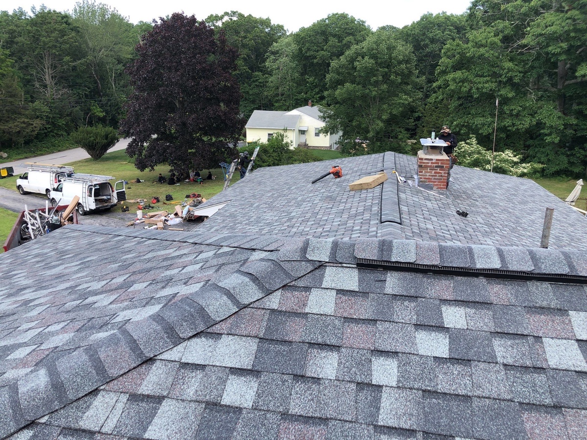 Chimney flashing work in progress Smithfield RI roof replacement