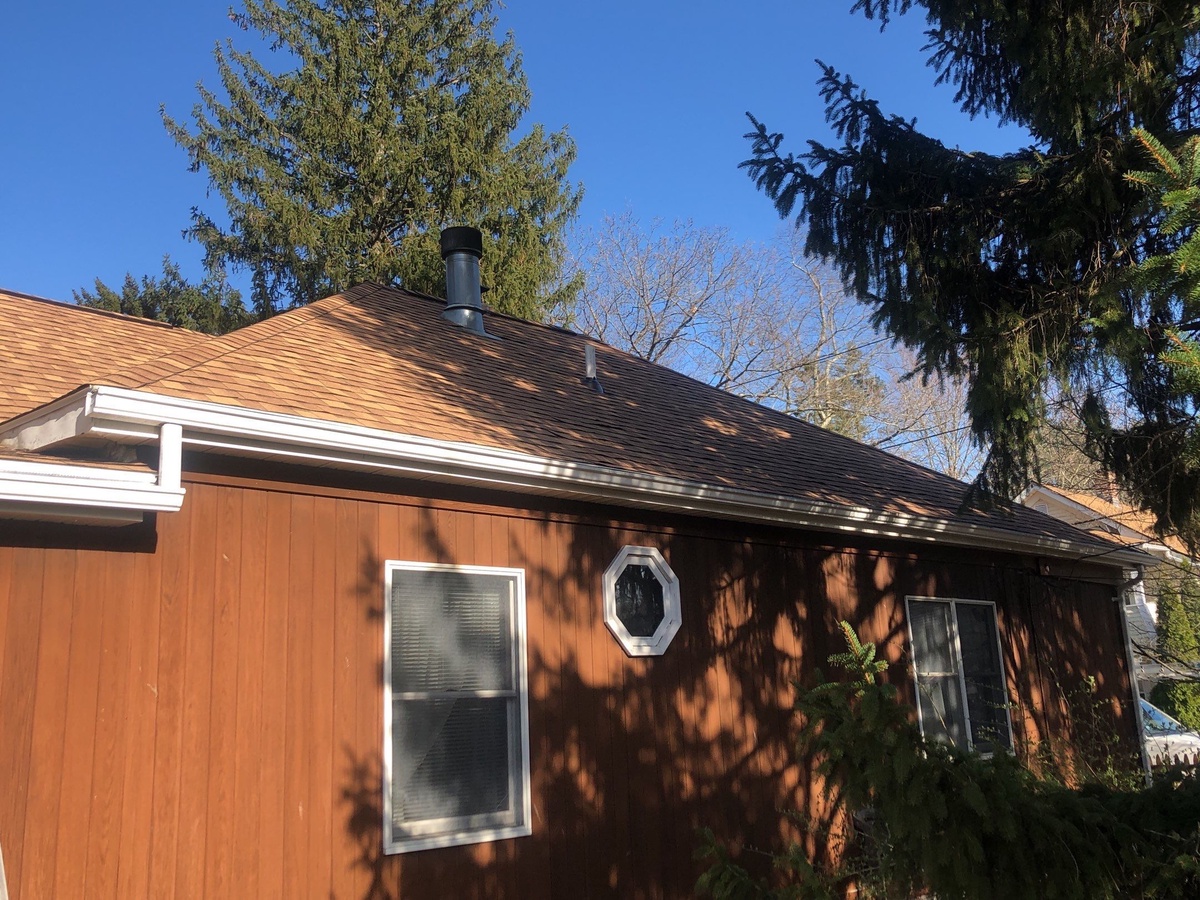 After — Wind Claim, Deck Repairs, and a Resawn Shake Finish — A Smithfield, RI Storm Restoration