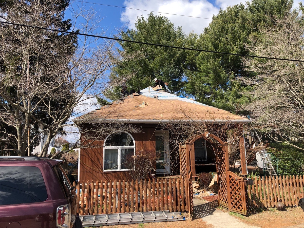 Wind Claim, Deck Repairs, and a Resawn Shake Finish — A Smithfield, RI Storm Restoration