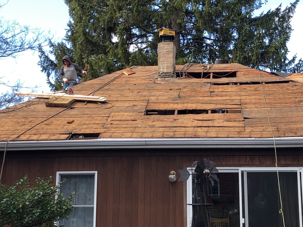 Wood deck repairs during Smithfield RI storm damage roof replacement