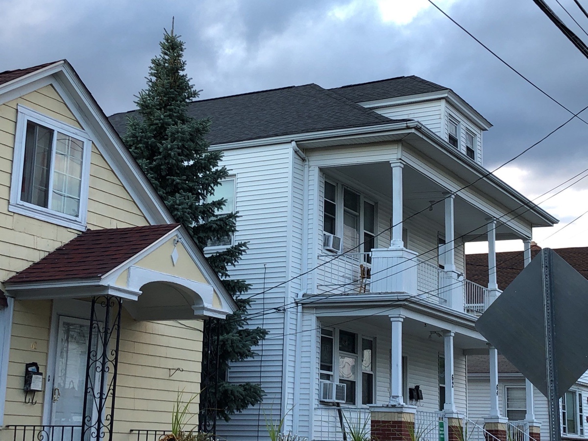 A Providence, RI Triple-Decker Reroofed After Wind Damage — CertainTeed Landmark Pewterwood, Insurance Approved