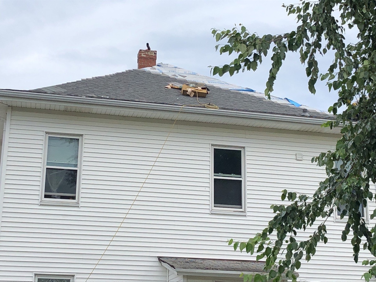 Roof replacement in progress Providence RI insurance claim