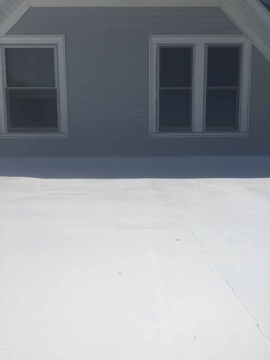Finished silicone roof meeting wall on Portsmouth RI home