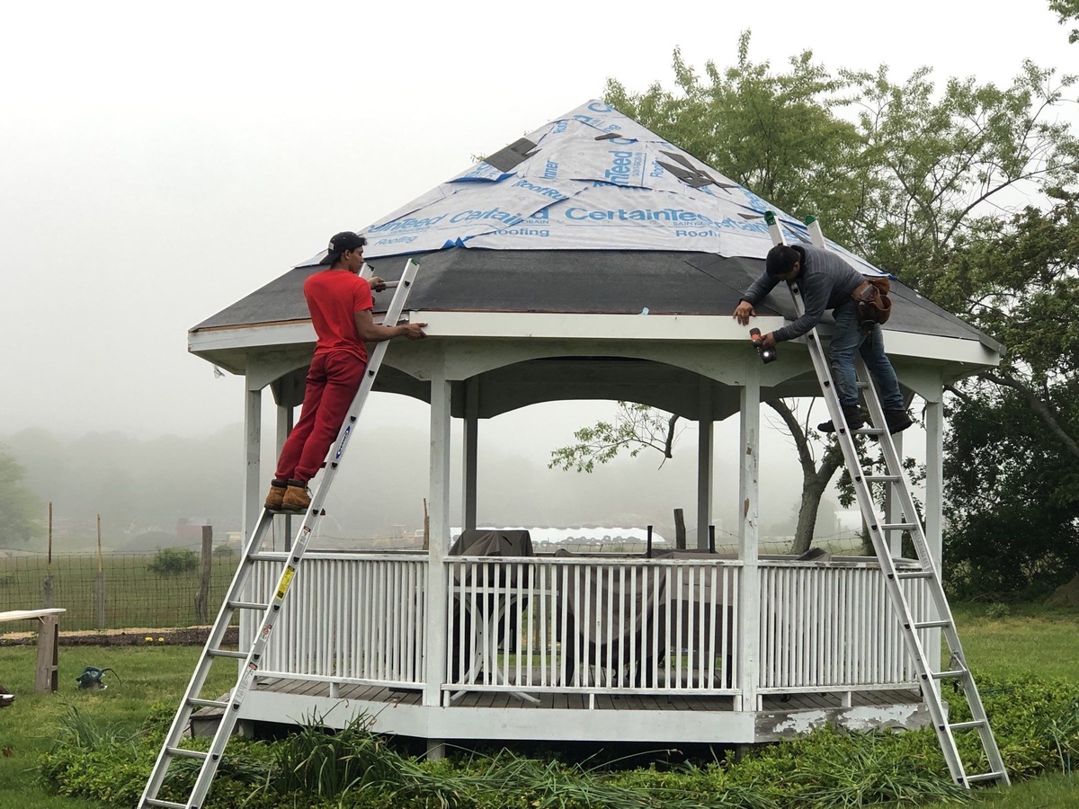 Crew installing new roof on gazebo Narragansett RI