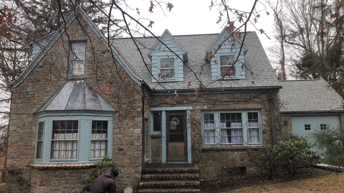 After — From Aging Wood Shingles to Landmark Cobblestone Gray — A Stone-Front Warwick, RI Roof Replacement
