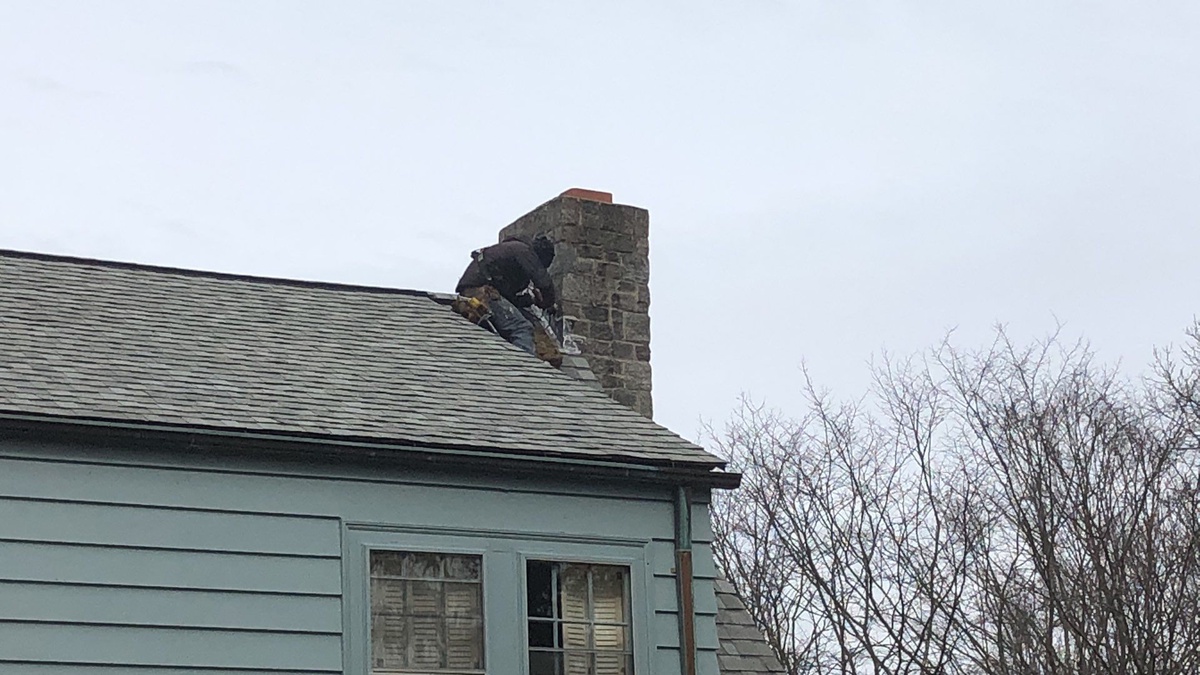 From Aging Wood Shingles to Landmark Cobblestone Gray — A Stone-Front Warwick, RI Roof Replacement