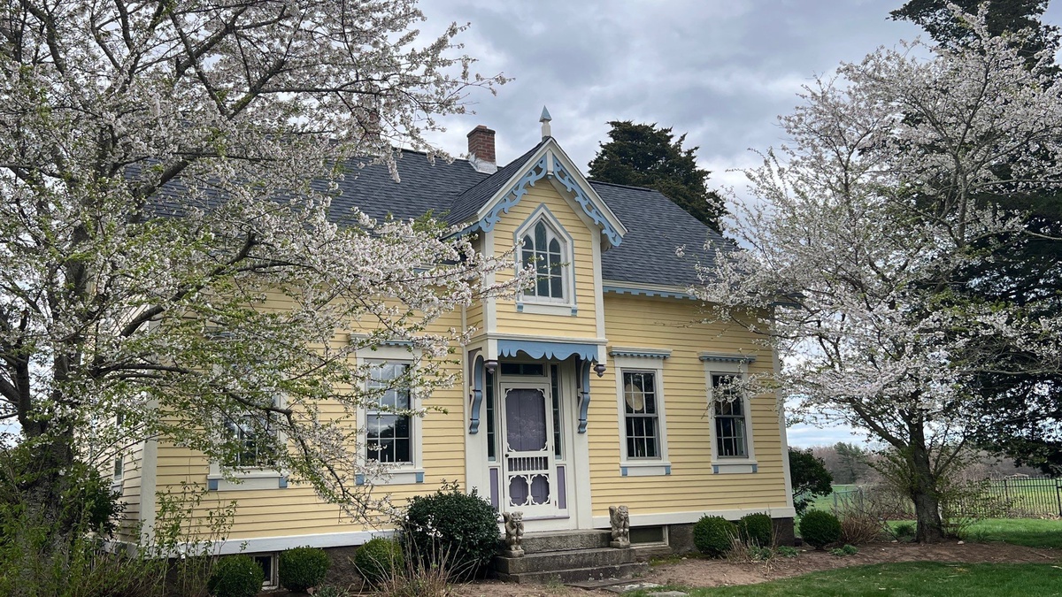 After — A Gothic Revival Farmhouse Rebuilt From the Deck Up — Landmark PRO Moire Black and VELUX Skylights in Richmond, RI