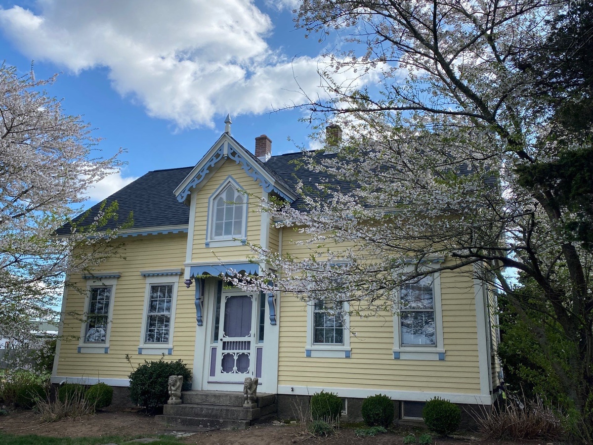 A Gothic Revival Farmhouse Rebuilt From the Deck Up — Landmark PRO Moire Black and VELUX Skylights in Richmond, RI
