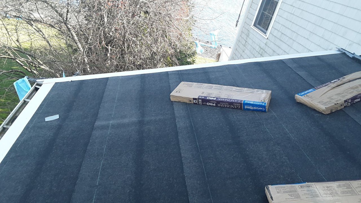 New underlayment going down on Portsmouth RI wind claim roof
