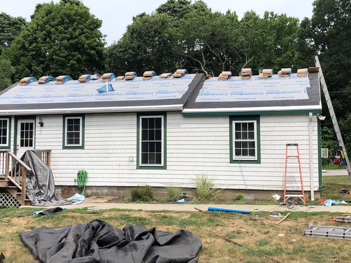 After — Seamless Gutters, PVC Trim, and Landmark in Birchwood — A Complete Edge Rebuild in Jamestown, RI