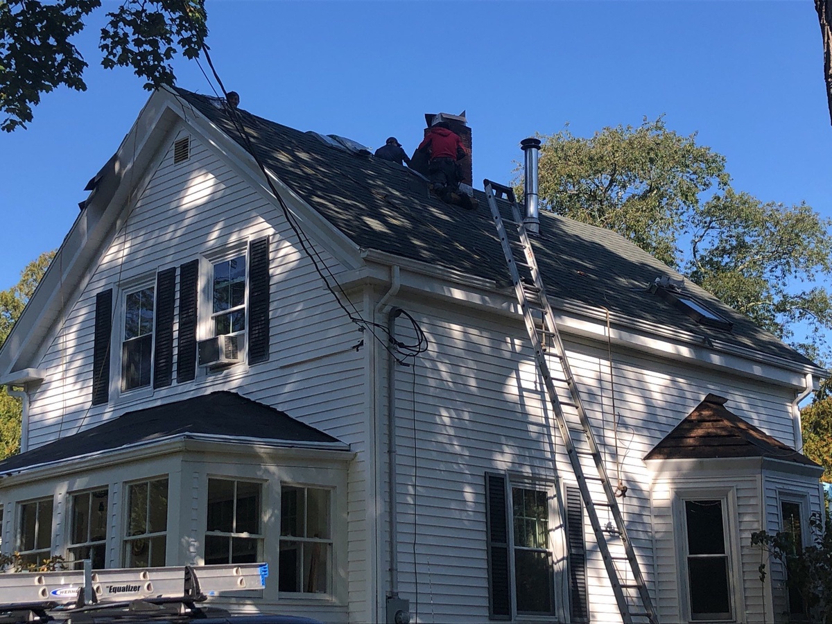 After — A 1900 Jamestown Home, a Wind Claim, and a Code-Upgrade Deck — TAMKO Heritage in Oxford Gray on Narragansett Avenue