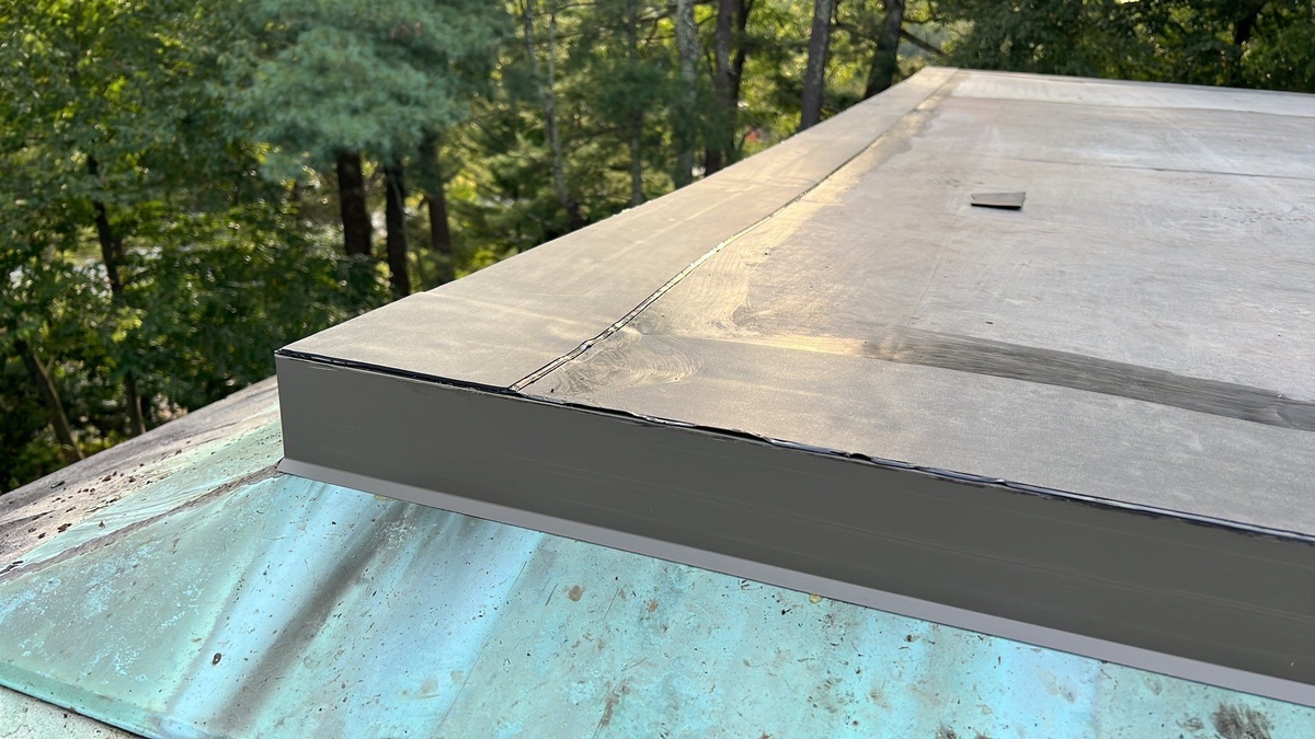New EPDM rubber roof edge detail on Glocester RI lodge