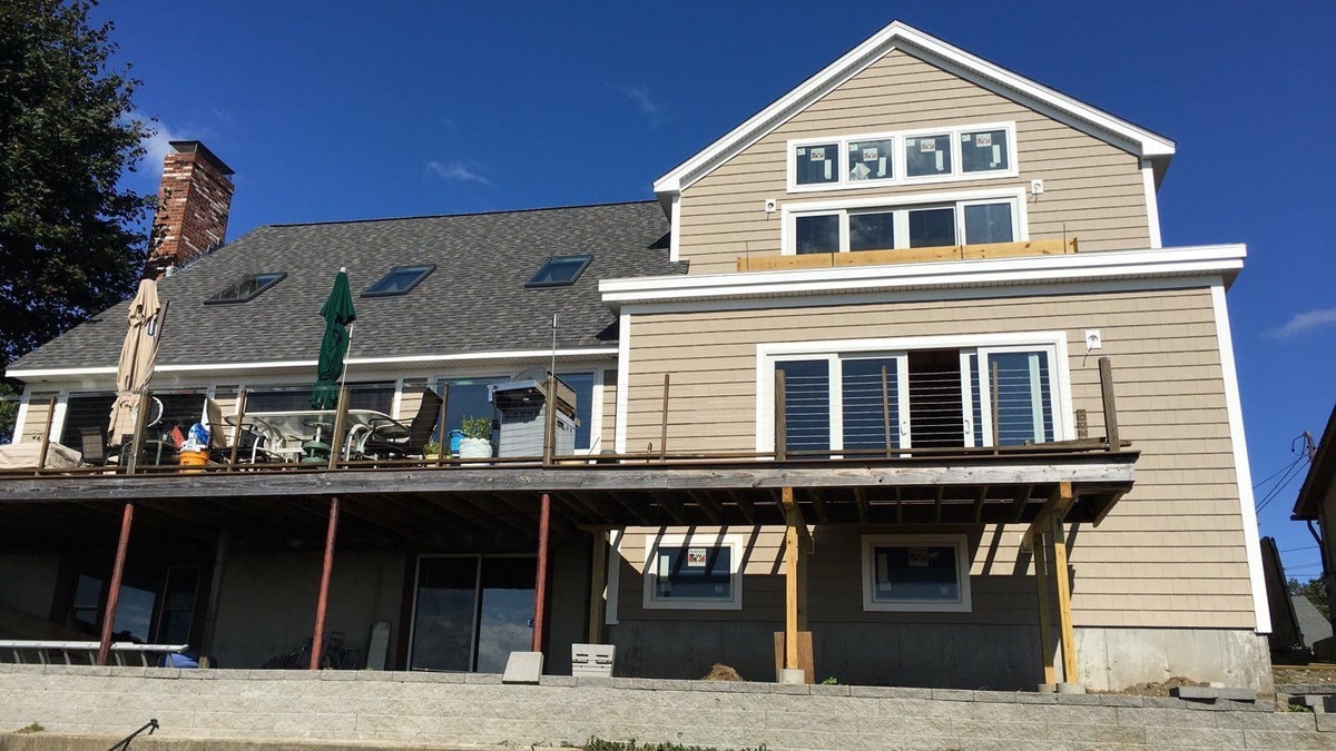 Landmark roof with VELUX skylights over waterfront Warwick home