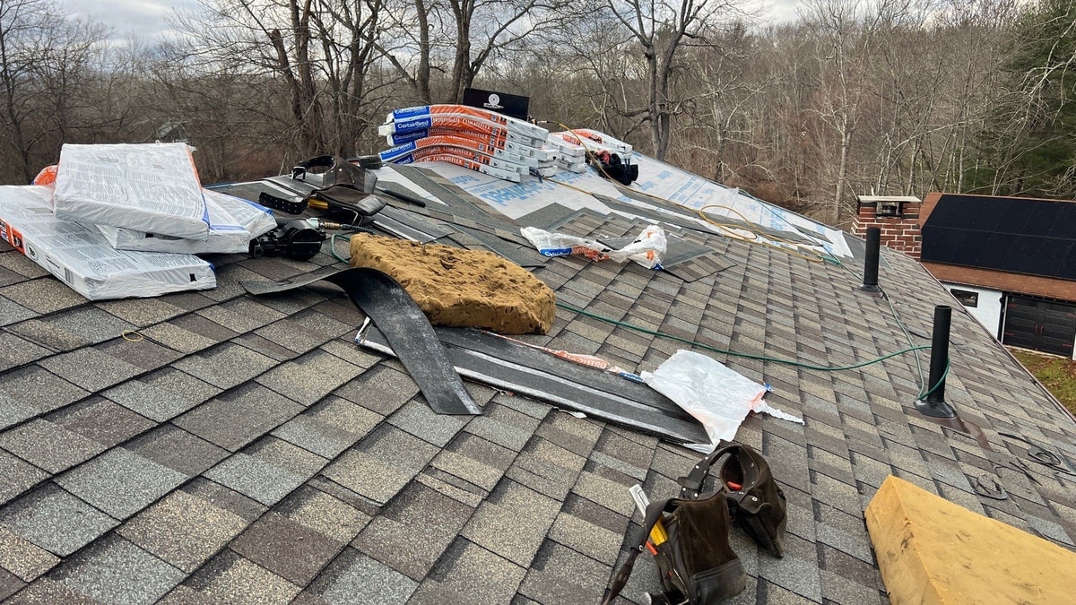 Weathered Wood shingles over Foster roof during install