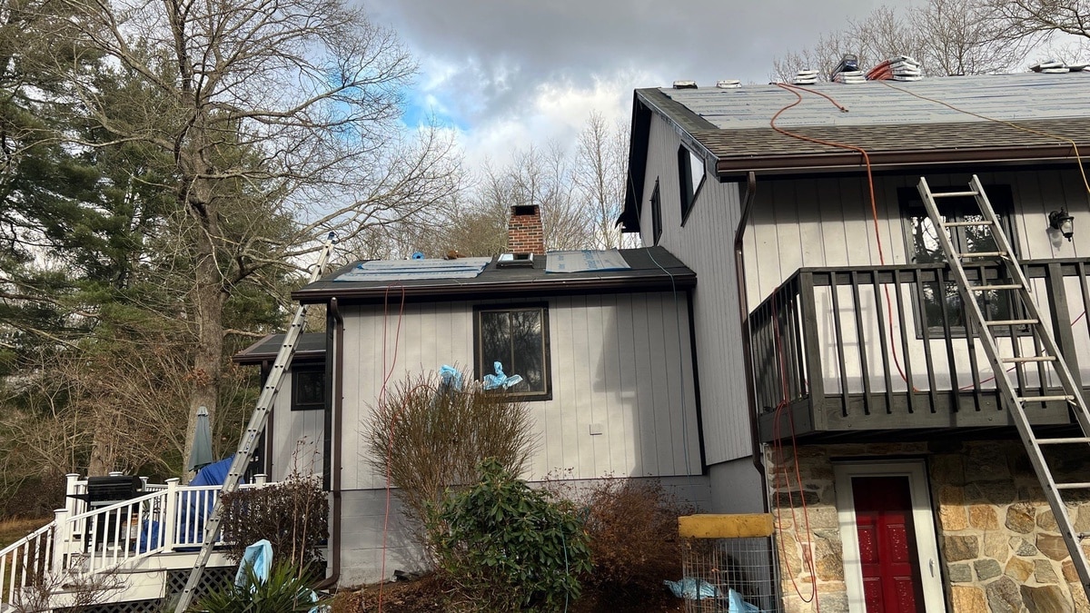 New Weathered Wood roofline and VELUX skylights, Foster home