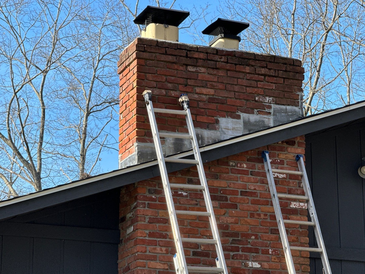 Chimney repair work during North Smithfield RI roof replacement