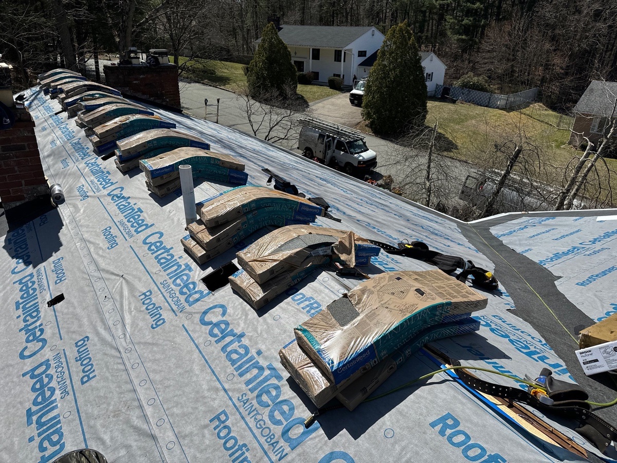 CertainTeed shingle bundles staged on North Smithfield RI roof