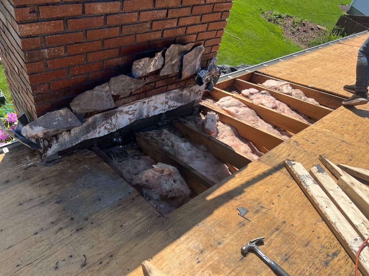 Replacing rotted roof decking around Cumberland chimney