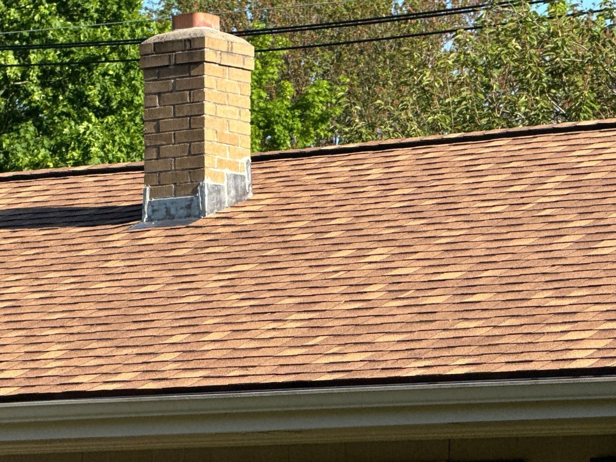 Brick chimney with new Resawn Shake shingles, Coventry