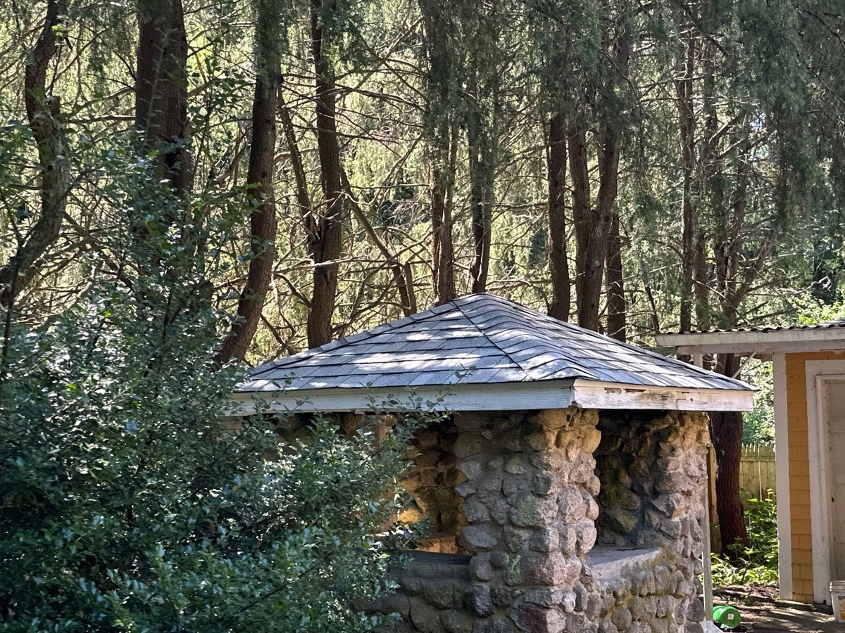 Stone springhouse with new CertainTeed Landmark roof West Warwick RI