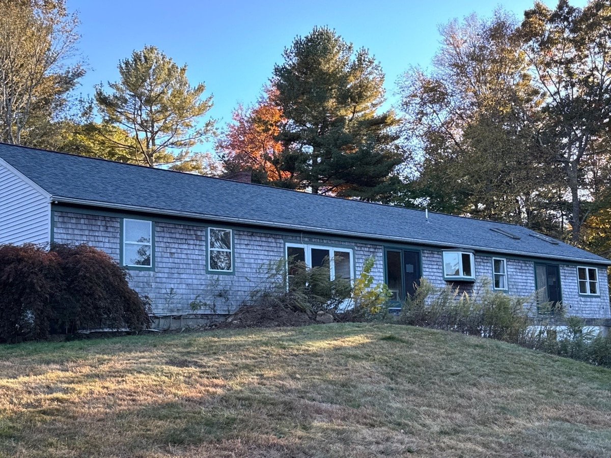 Colonial Slate roofline over cedar-shake West Greenwich ranch