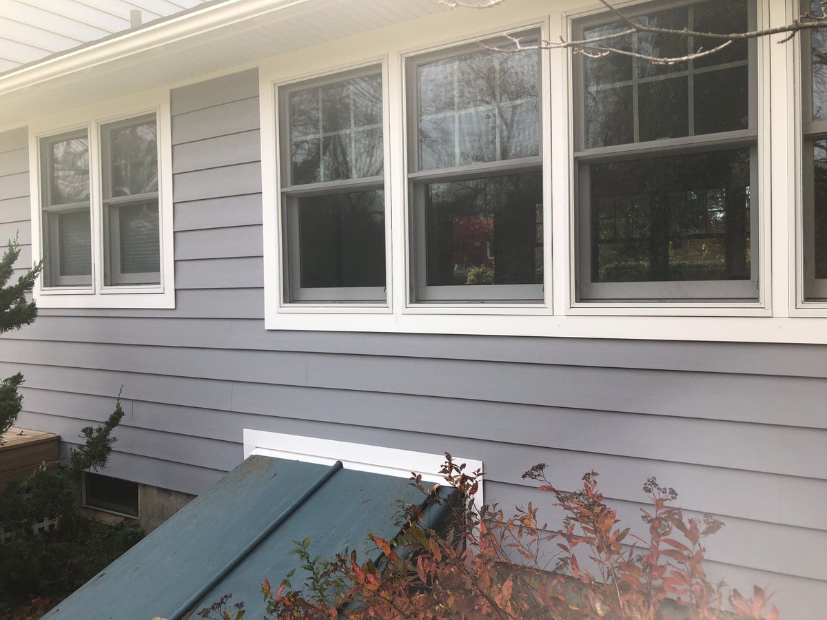 Everlast Seaside Gray siding with white PVC trim, South Kingstown sunroom