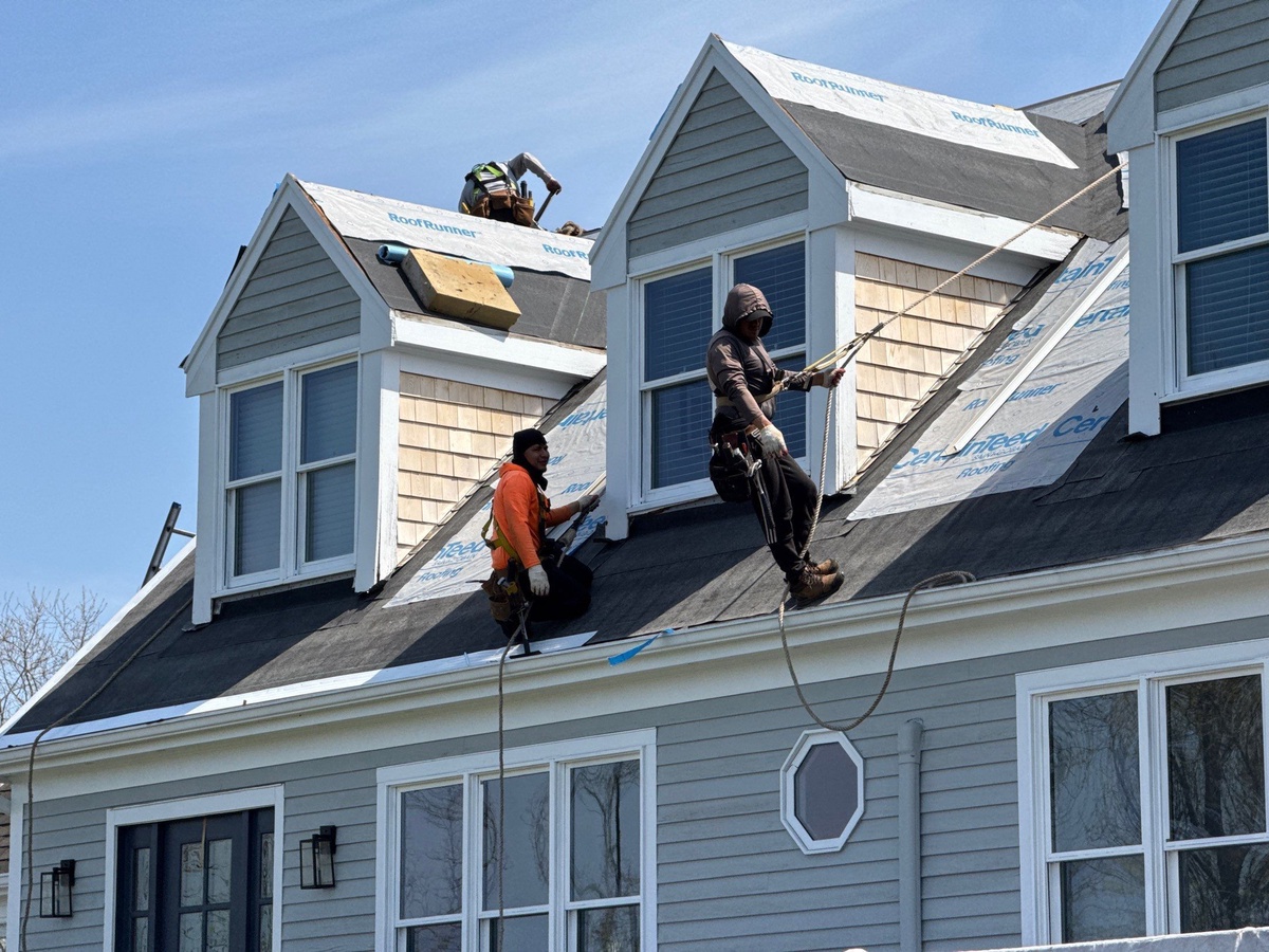 Crew working on dormers Barrington RI roof replacement