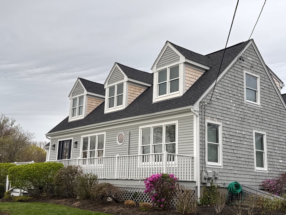 After — Roof, Skylights, and Cedar Siding by the Bay — CertainTeed Landmark Charcoal Black in Barrington, RI