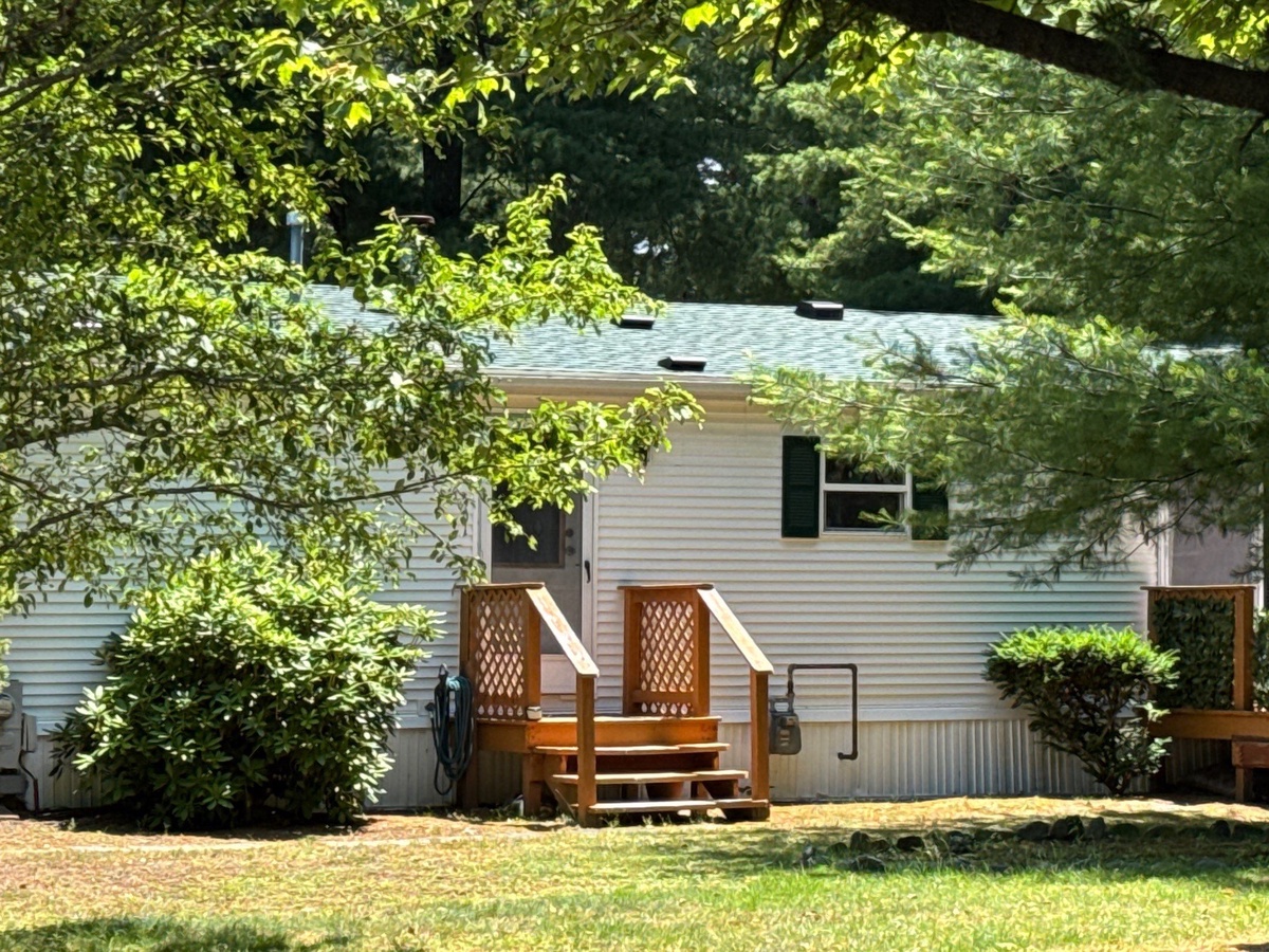 Rear yard view of Landmark PRO Evergreen roof Coventry RI