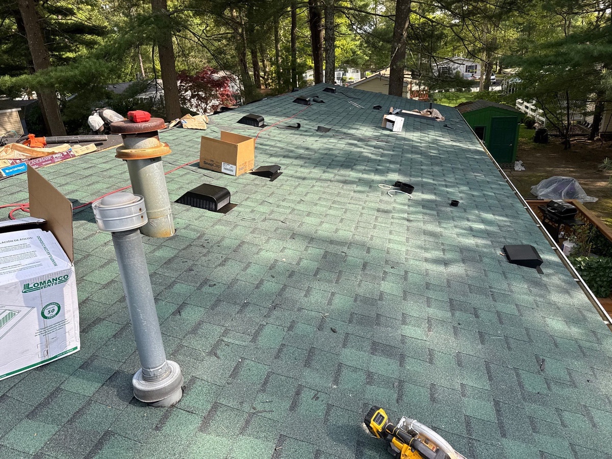Evergreen shingle field with pipe boot detail Coventry RI