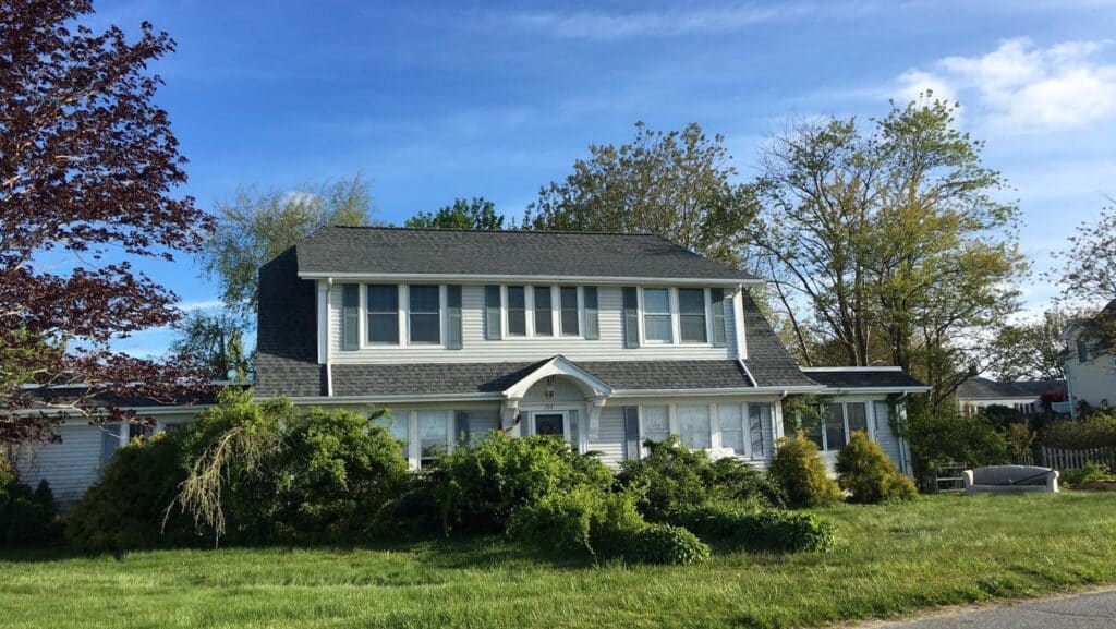 Portsmouth RI home with a new architectural shingle roof replacement.
