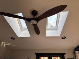 Skylight installation in Exeter, RI, showing two new Velux skylights and a ceiling fan