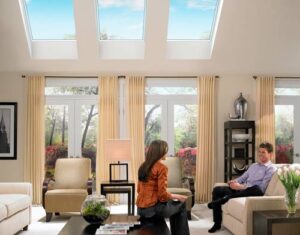 Bright living room with three new Velux skylights in Newport, RI, letting in natural light.