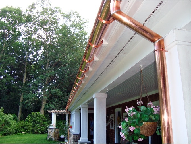 Half round copper gutter installed by Pinnacle Roofing and Skylights