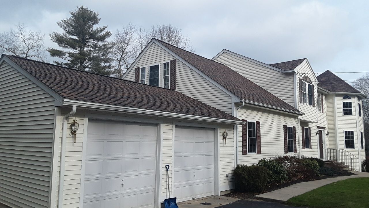 Completed West Greenwich storm roofing project, Burnt Sienna shingles