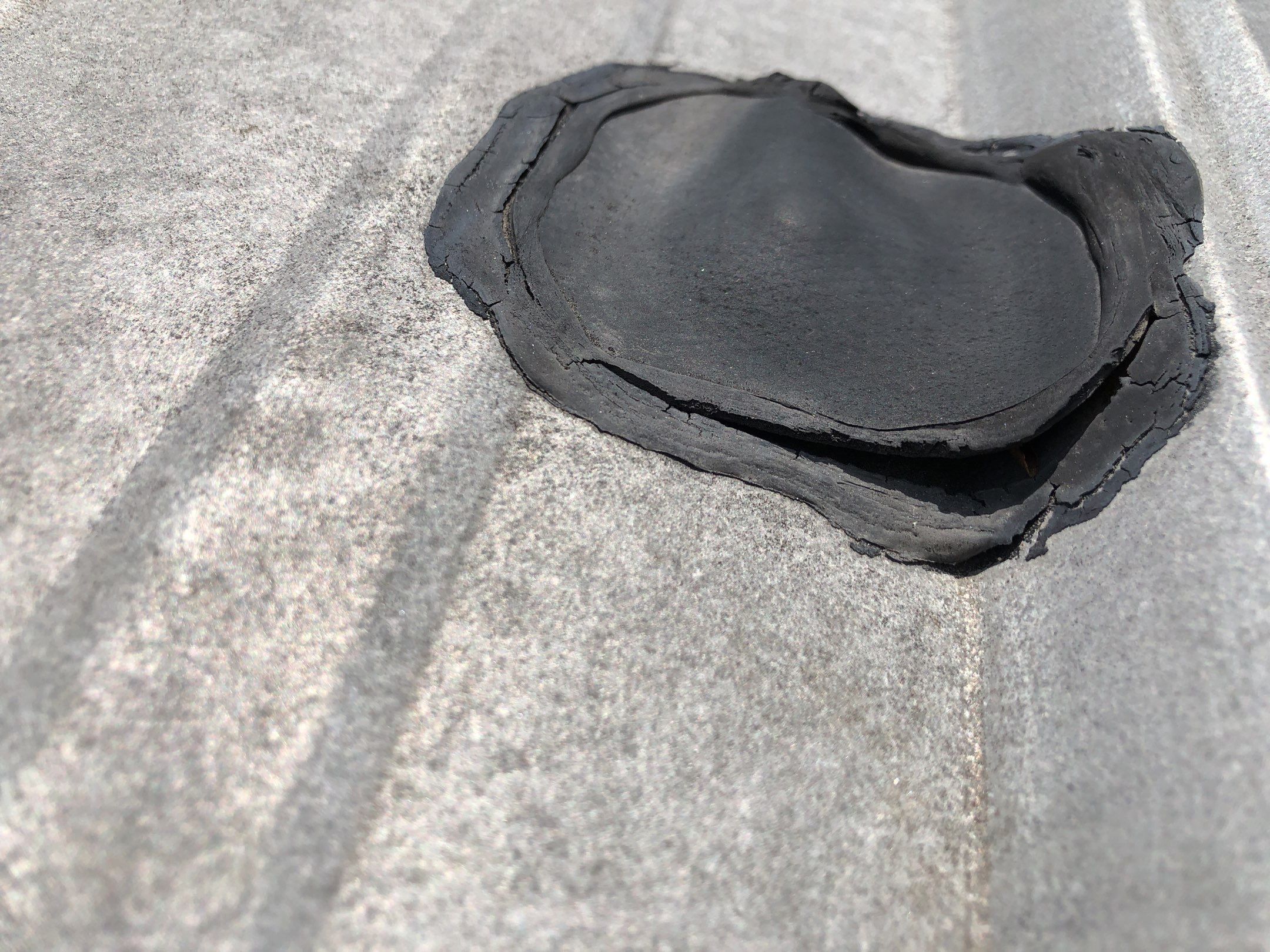Repaired roof penetration on Cranston commercial metal roof