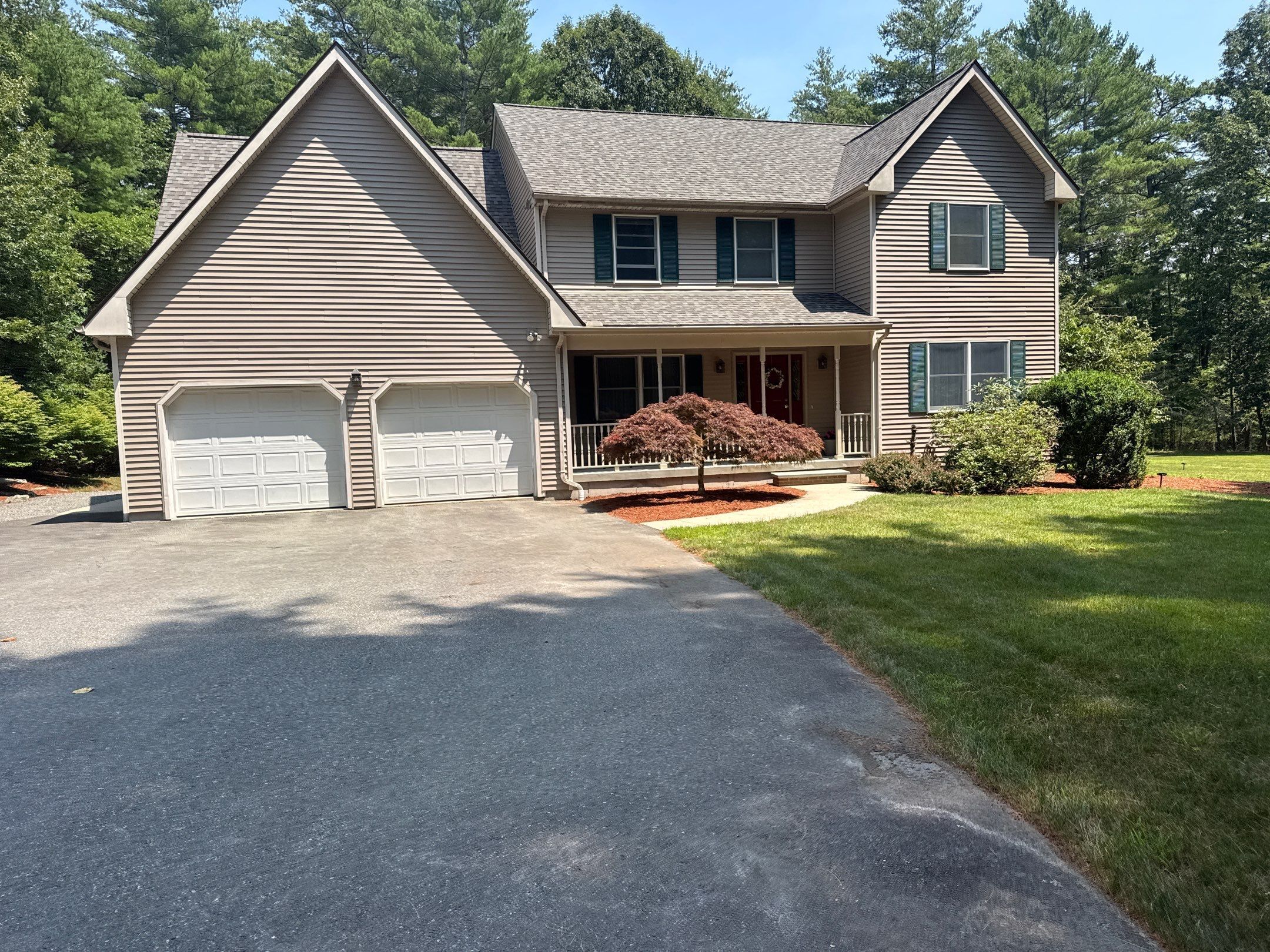 After — Scituate, RI Siding Replacement — Fresh Taupe Exterior With Weather-Tight Trim