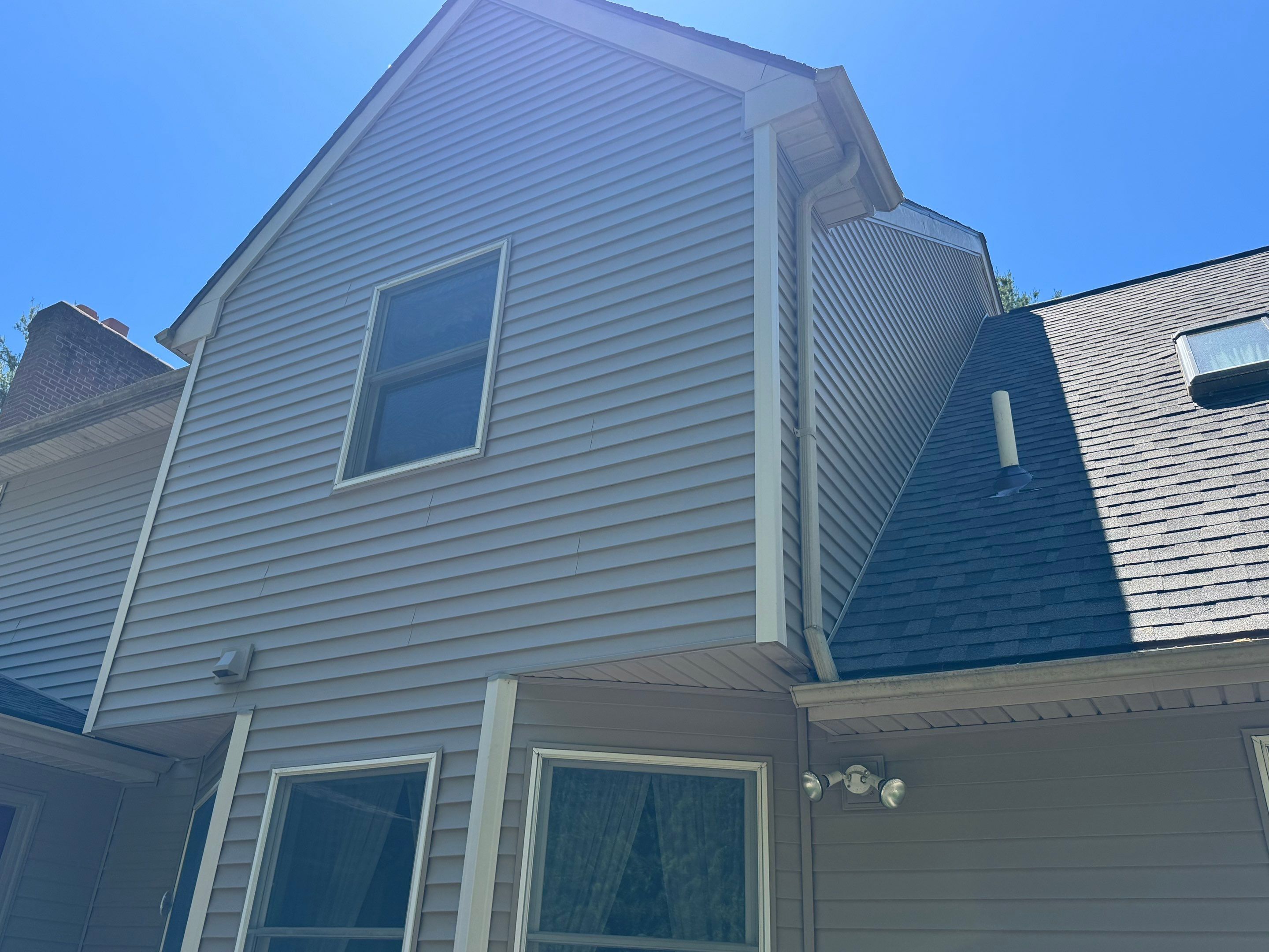 Scituate siding replacement, finished taupe exterior and upper roofline