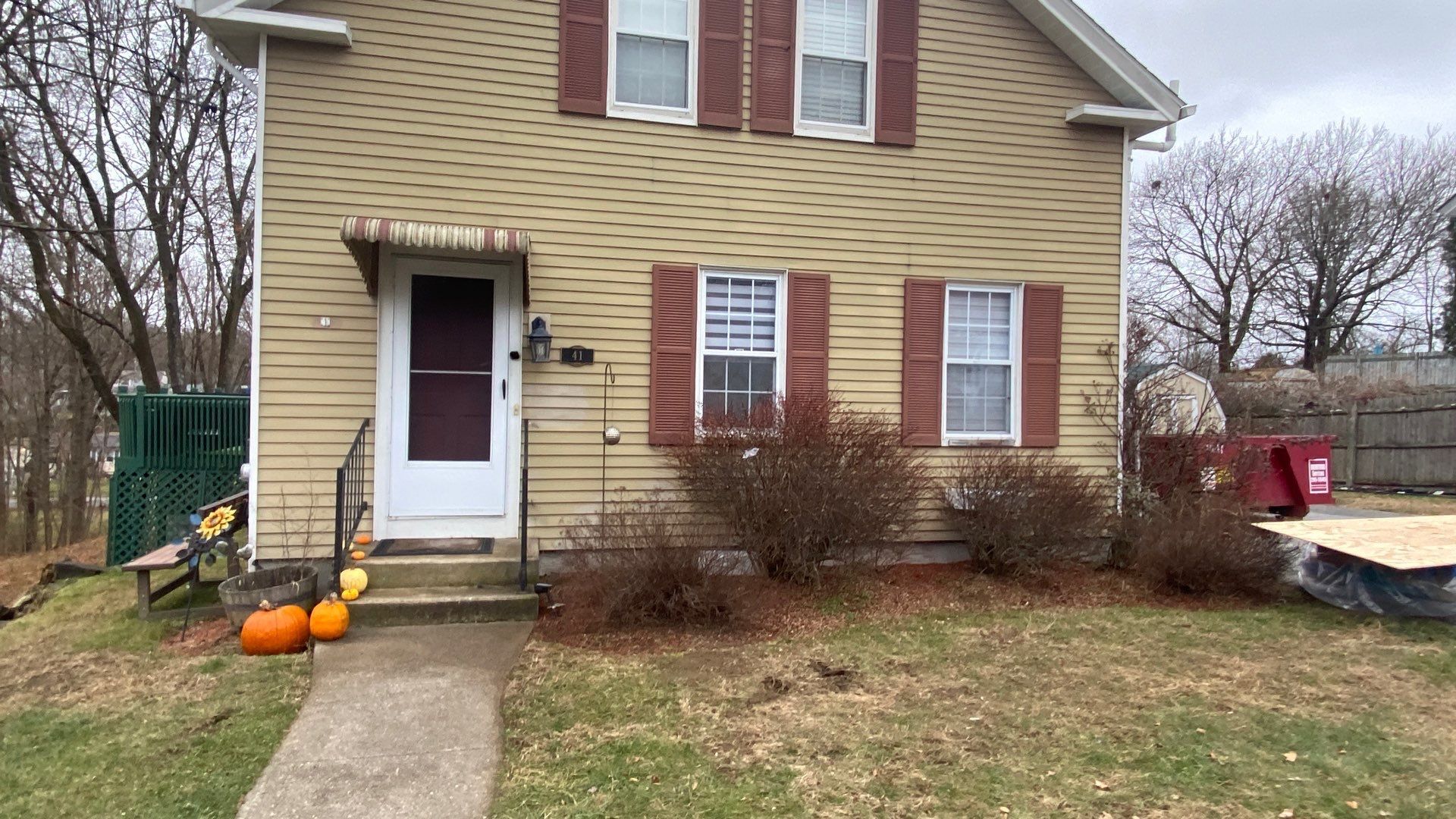 Front elevation after storm roof replacement, West Warwick